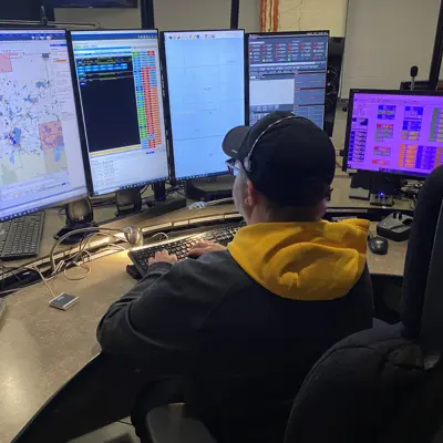 Dispatcher sits at computer