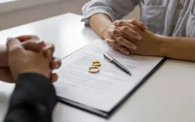 Two people review a marriage license