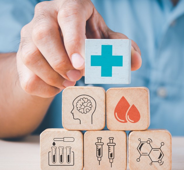 Nurse holds wooden health blocks