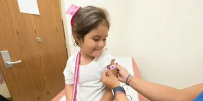 Child receives a vaccination